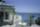 1208943940_beachsidehousewave